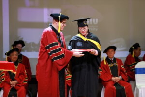 Fostering the next generation: Prof. Dr. Sven David participating in the Bachelor's degree awarding ceremony at Saigon University, in his role as Professor.